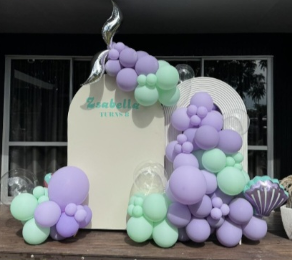 Luxe double arch with balloon garland