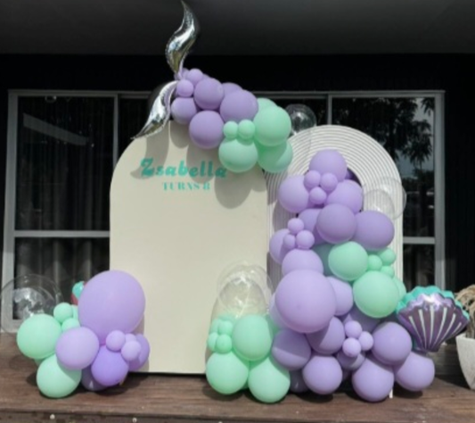 Luxe double arch with balloon garland